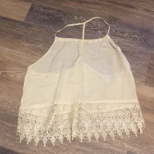 Open back light weight cream top